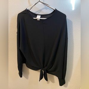 Black long sleeve top with tie front.